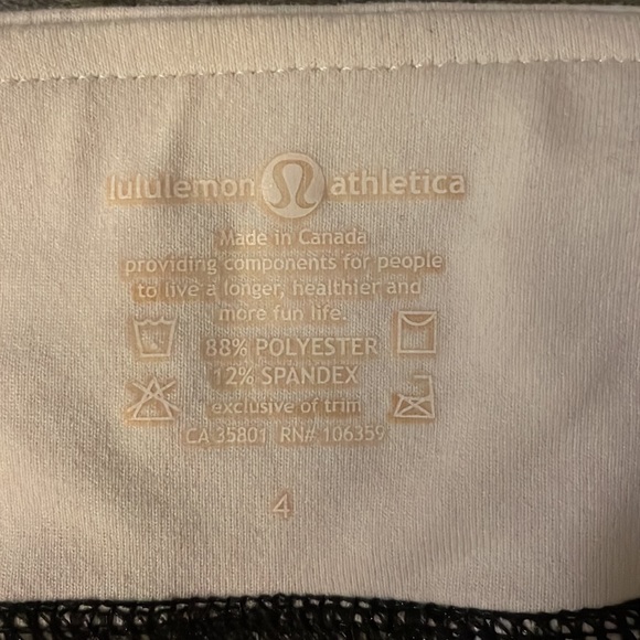 Lululemon size 4 Black shorts white band. - Picture 3 of 3